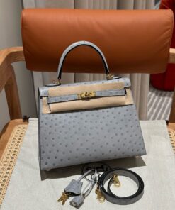HERMES KELLY - 25 - BLUE GLACIER - OSTRICH - GHW