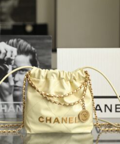 CHANEL 22 - MINI - LIGHT YELLOW - SHINY CALFSKIN - GOLD